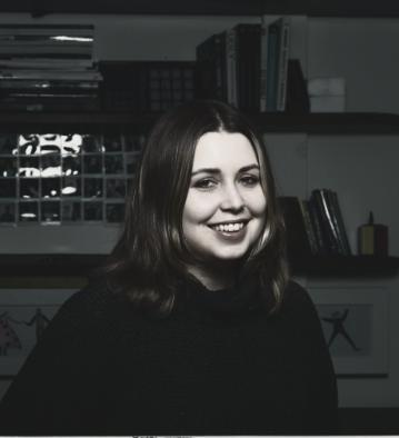 Portrait headshot of our artist in residence, Amelia Daiz
